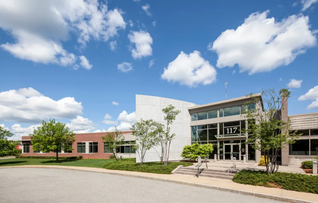 an outside shot of a commercial real estate property for lease by Bulfinch Companies, located on 117 Kendrick Street in Needham, MA.